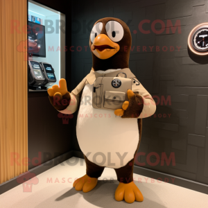 Tan Penguin mascot costume character dressed with a Jumpsuit and Smartwatches