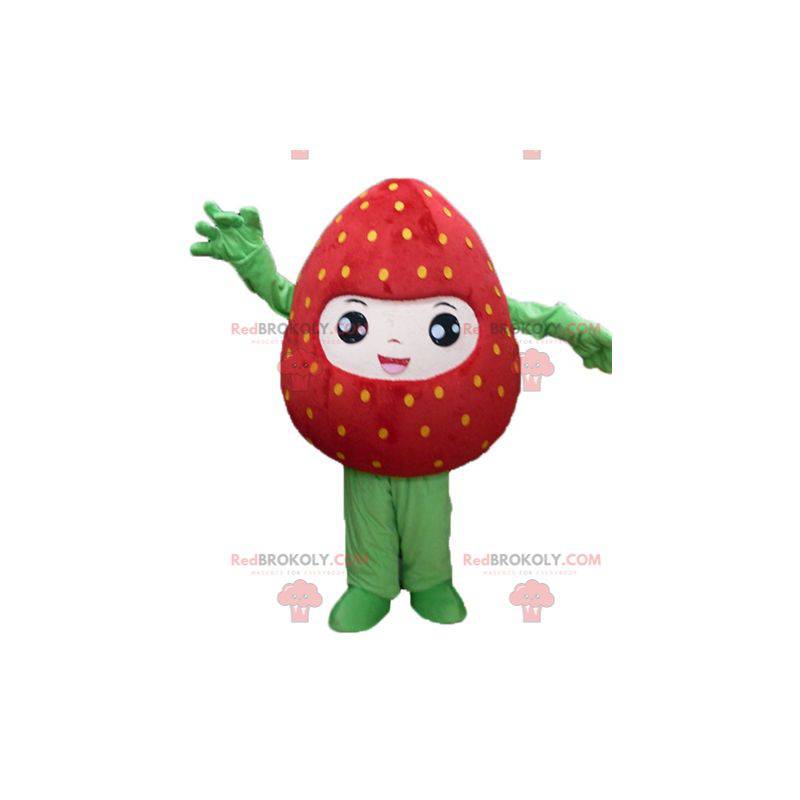 Mascote gigante de morango vermelho e verde sorrindo -