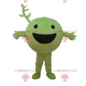 Mascotte de petit pois de fruit de légume vert très souriant -