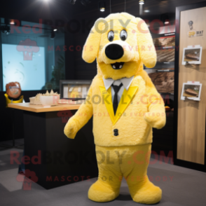 Yellow Shepard'S Pie mascot costume character dressed with a Suit Pants and Brooches