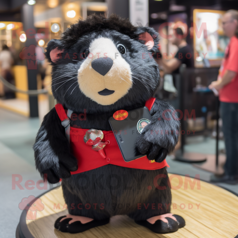 Black Guinea Pig mascot costume character dressed with a Shorts and Brooches Black Guinea Pig mascot costume character dressed with a Shorts and Brooches