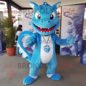 Sky Blue Hydra mascot costume character dressed with a Oxford Shirt and Bracelets