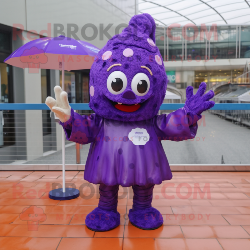 Purple Cupcake mascot costume character dressed with a Raincoat and Mittens Purple Cupcake mascot costume character dressed with a Raincoat and Mittens