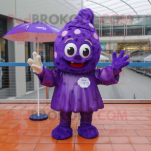 Purple Cupcake mascot costume character dressed with a Raincoat and Mittens