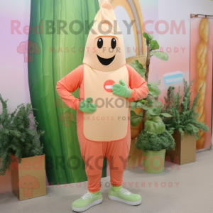 Peach Asparagus mascot costume character dressed with a Sweatshirt and Beanies