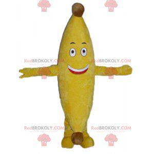 Mascotte de banane jaune géante et souriante - Redbrokoly.com