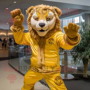 Gold Tamer Lion mascot costume character dressed with a Hoodie and Mittens