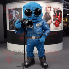 Blue Camera mascot costume character dressed with a Biker Jacket and Shoe clips