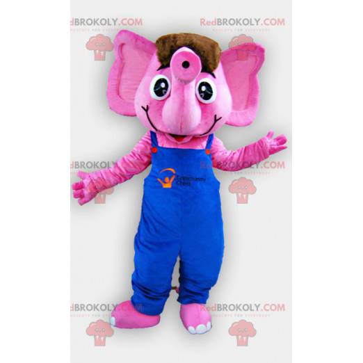 Mascotte d'éléphant rose avec une salopette bleue -