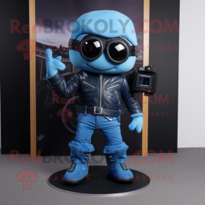 Blue Camera mascot costume character dressed with a Biker Jacket and Shoe clips