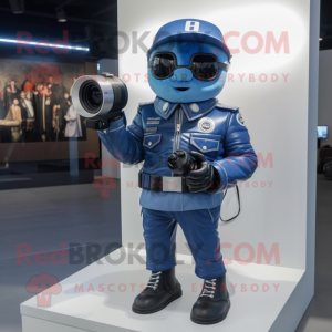 Blue Camera mascot costume character dressed with a Biker Jacket and Shoe clips