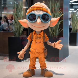 Orange Elf mascot costume character dressed with a Jeans and Sunglasses