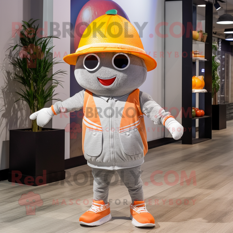 Gray Grapefruit mascot costume character dressed with a Shorts and Beanies