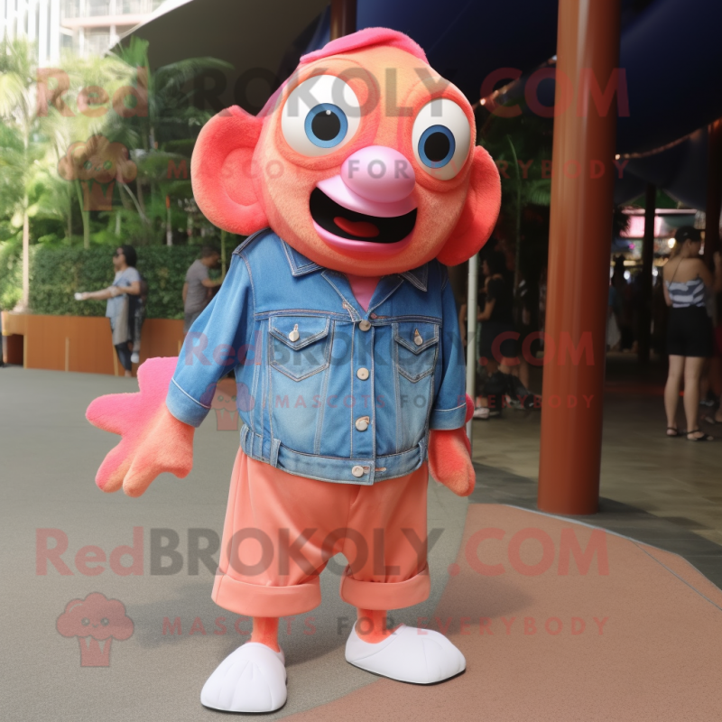 Pink Clown Fish mascot costume character dressed with a Denim Shorts and Lapel pins