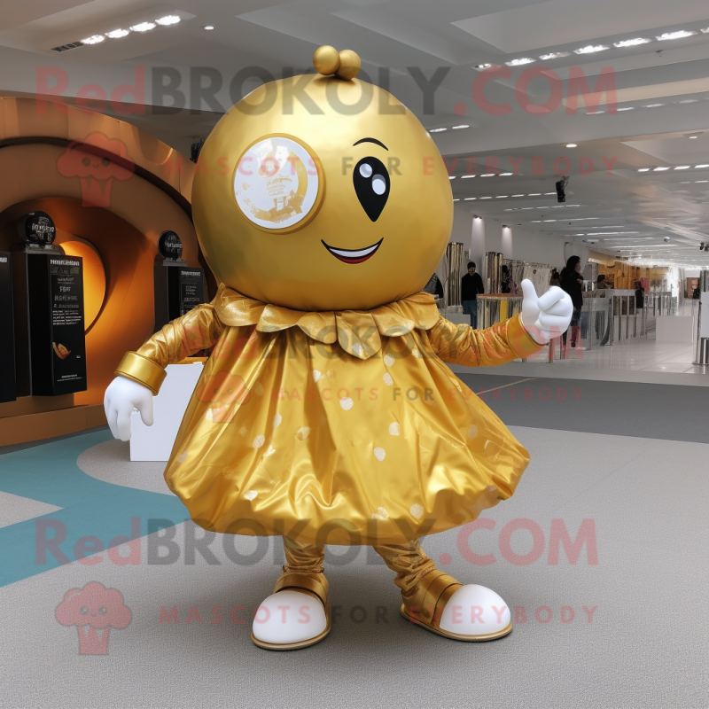 Gold Human Cannon Ball mascot costume character dressed with a Wrap Skirt and Anklets