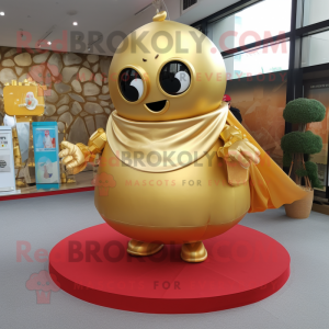 Gold Human Cannon Ball mascot costume character dressed with a Wrap Skirt and Anklets