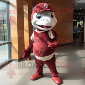 Maroon Dolphin mascot costume character dressed with a Skinny Jeans and Foot pads