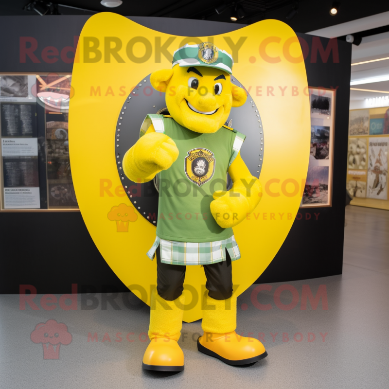 Yellow Celtic Shield mascot costume character dressed with a Skinny Jeans and Caps Yellow Celtic Shield mascot costume character dressed with a Skinny Jeans and Caps