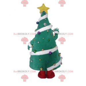 Christmas tree mascot decorated with a broad smile -