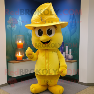 Gold Scented Candle mascot costume character dressed with a Bermuda Shorts and Hats