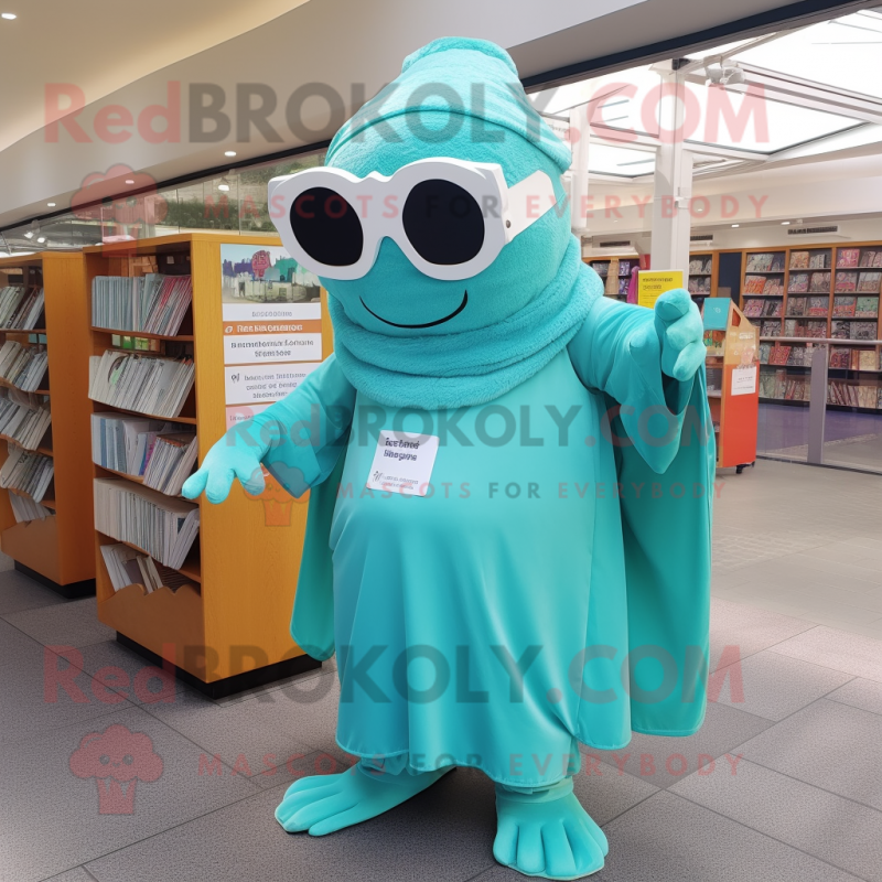Turquoise Lasagna mascot costume character dressed with a Culottes and Reading glasses Turquoise Lasagna mascot costume character dressed with a Culottes and Reading glasses