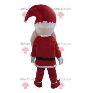 Mascotte di Babbo Natale vestito in abiti tradizionali -