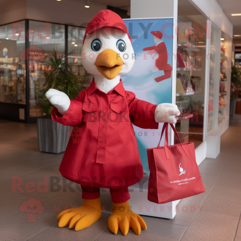 Red Gosling mascot costume character dressed with a Poplin Shirt and Tote bags