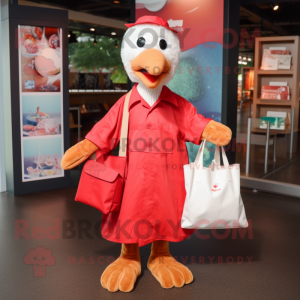 Red Gosling mascot costume character dressed with a Poplin Shirt and Tote bags