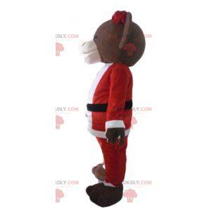 Mascota del oso de peluche marrón en traje de Santa Claus -