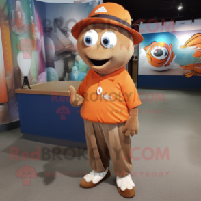 Brown Clown Fish mascot costume character dressed with a Polo Tee and Hat pins