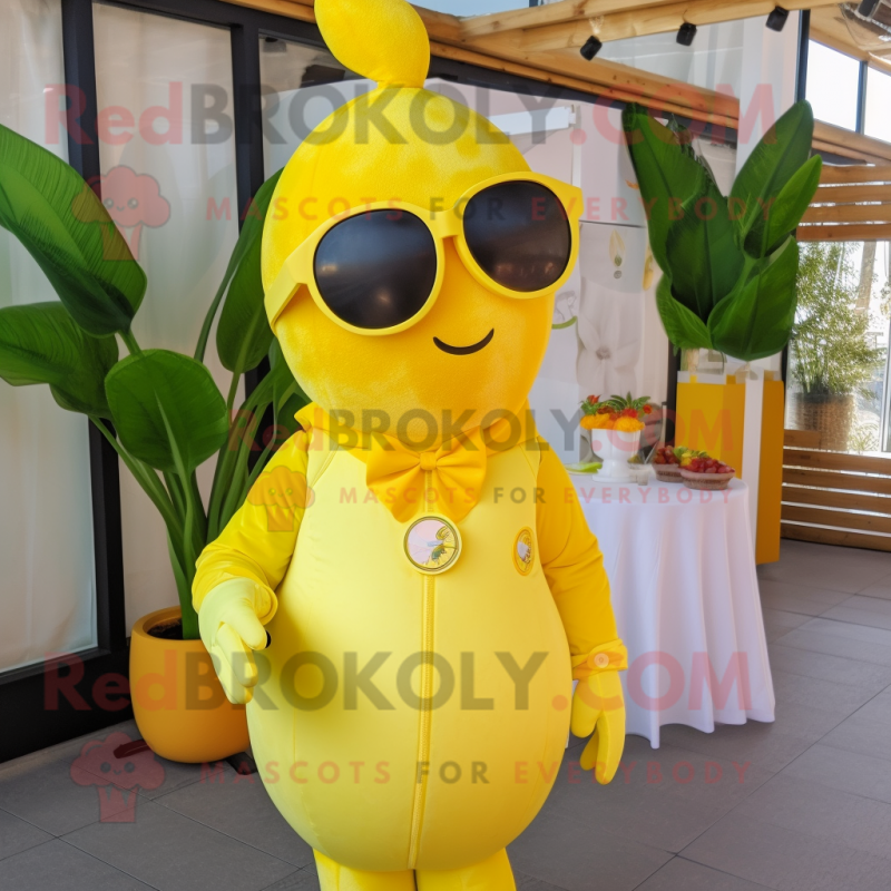 Lemon Yellow Goulash mascot costume character dressed with a Romper and Sunglasses Lemon Yellow Goulash mascot costume character dressed with a Romper and Sunglasses