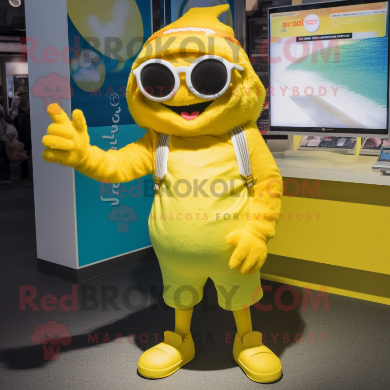 Lemon Yellow Goulash mascot costume character dressed with a Romper and Sunglasses Lemon Yellow Goulash mascot costume character dressed with a Romper and Sunglasses