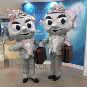 Silver Fish And Chips mascot costume character dressed with a Blouse and Briefcases