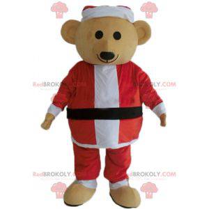 Mascota del oso de peluche en traje de Santa Claus -