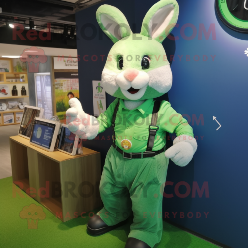 Green Rabbit mascot costume character dressed with a Oxford Shirt and Bracelet watches