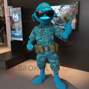 Turquoise Marine Recon mascot costume character dressed with a Swimwear and Bracelets