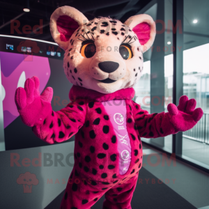 Magenta Cheetah mascot costume character dressed with a Cardigan and Mittens