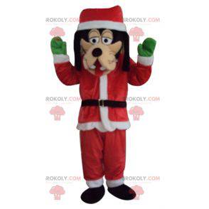 Mascotte Pippo vestito con un abito di Babbo Natale -