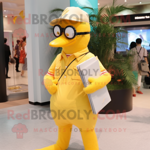 Yellow Seagull mascot costume character dressed with a Flare Jeans and Reading glasses