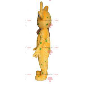 Yellow alien mascot with green peas - Redbrokoly.com