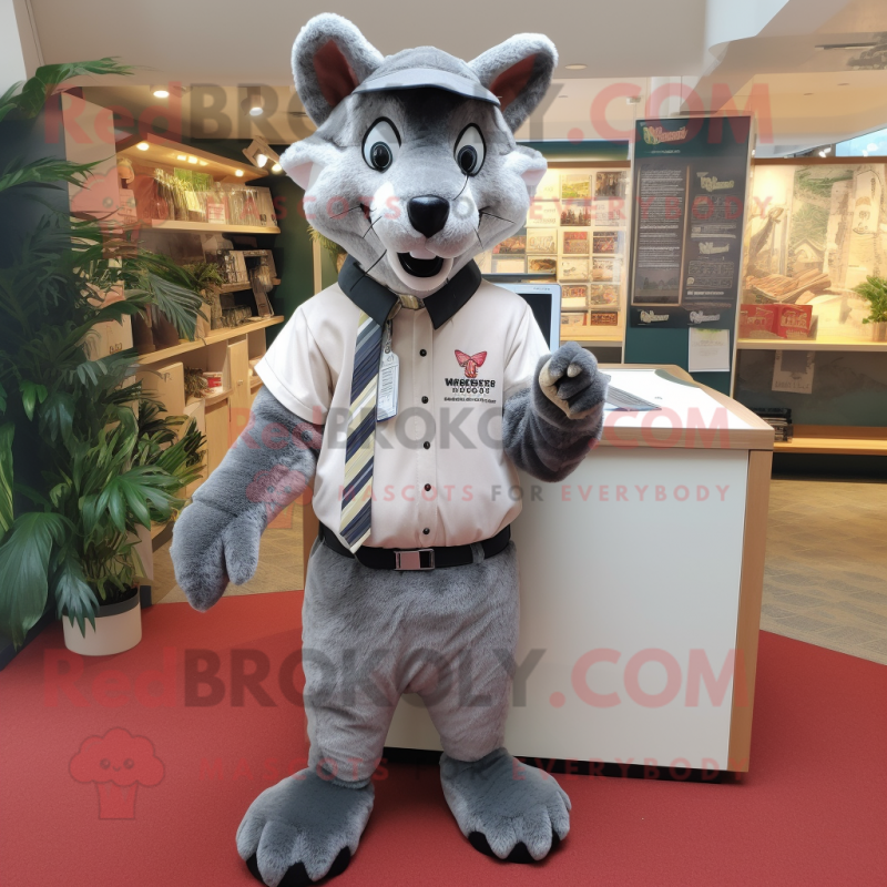 Gray Thylacosmilus mascot costume character dressed with a Oxford Shirt and Keychains