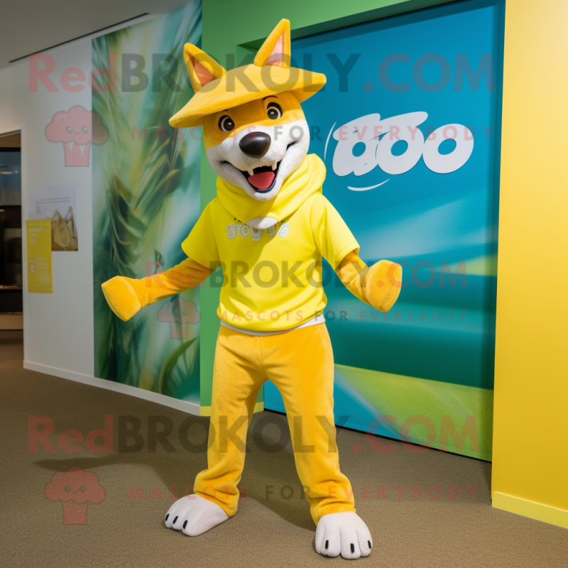 Yellow Dingo mascot costume character dressed with a Capri Pants and Headbands