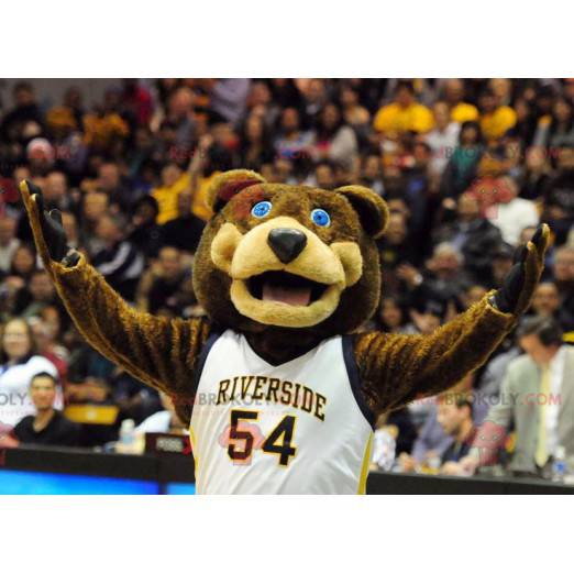Brown bear mascot with blue eyes in sportswear - Redbrokoly.com