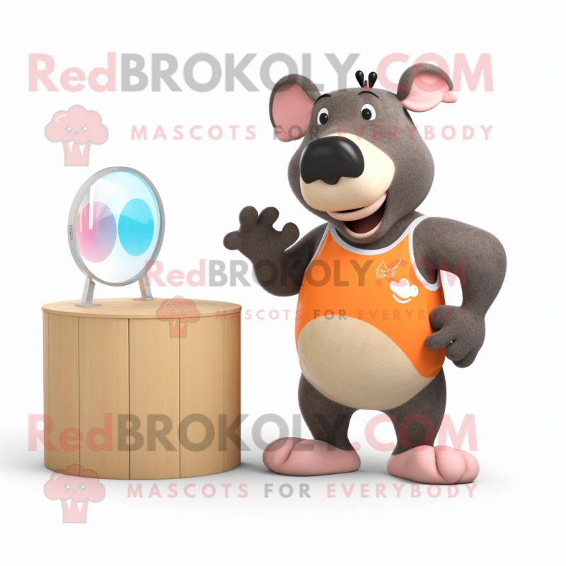 Peach Tapir mascot costume character dressed with a Board Shorts and Watches