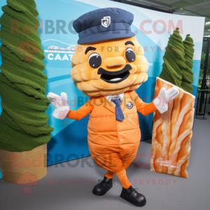 Orange Croissant mascot costume character dressed with a Chambray Shirt and Lapel pins
