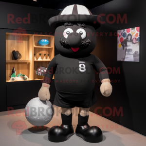 Black Rugby Ball mascot costume character dressed with a Romper and Hat pins