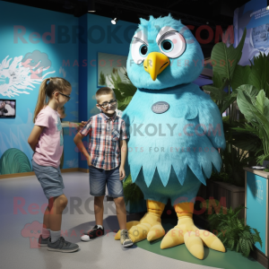 Turquoise Eagle mascot costume character dressed with a Chambray Shirt and Watches