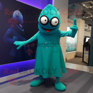 Teal Cyclops mascot costume character dressed with a Midi Dress and Cufflinks