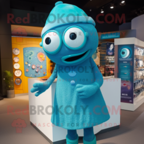 Teal Cyclops mascot costume character dressed with a Midi Dress and Cufflinks