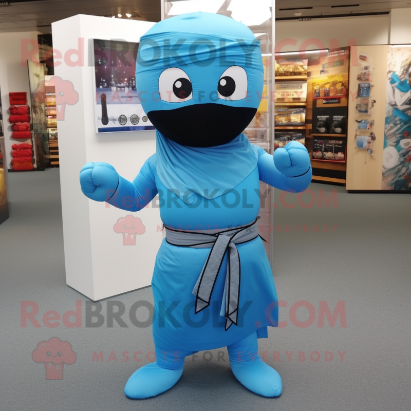 Sky Blue Ninja mascot costume character dressed with a Mini Skirt and Scarves Sky Blue Ninja mascot costume character dressed with a Mini Skirt and Scarves